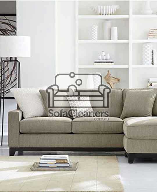 Gold Coast grey couch in living room 